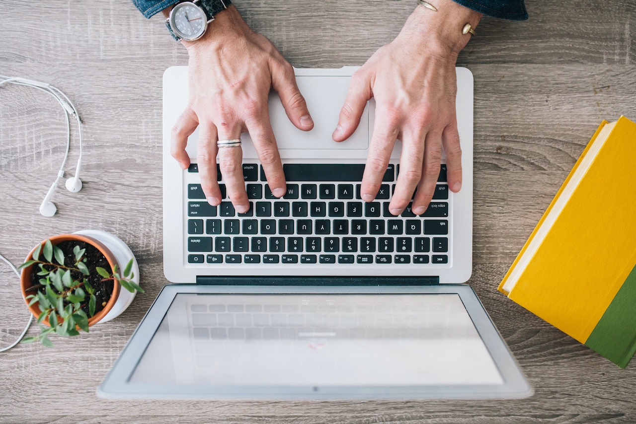 man updating rental website